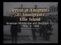 Immigrants_Carry_Luggage_through_Ellis_Island_ca__1906